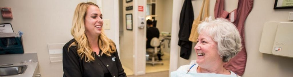 CRCID restorative dentist providing a consultation
